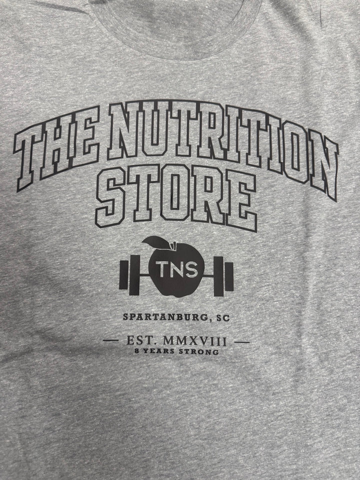 Heather gray collegiate TNS shirt — front graphic detail