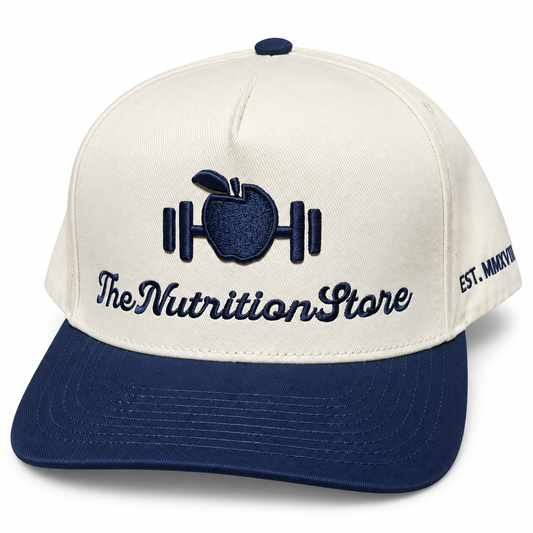 Legacy Hat in blue with cream crown and embroidered The Nutrition Store logo