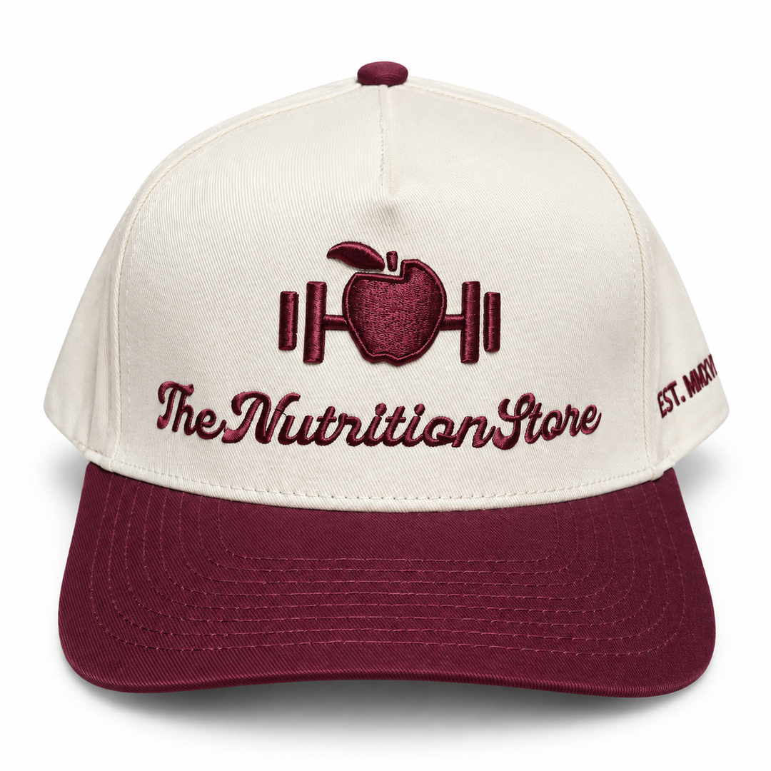 Legacy Hat in red with cream crown and embroidered The Nutrition Store logo