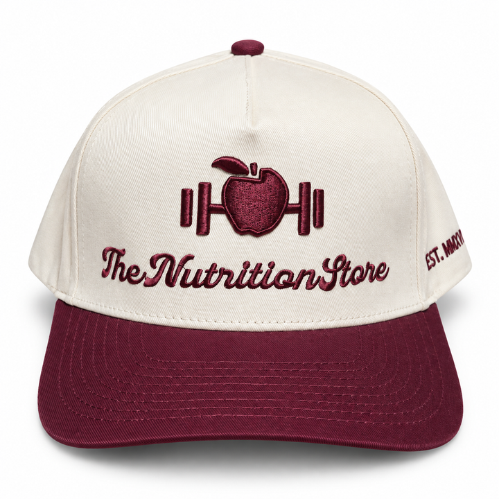Legacy Hat in red with cream crown and embroidered The Nutrition Store logo